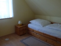 Schlafzimmer mit Tandembett 