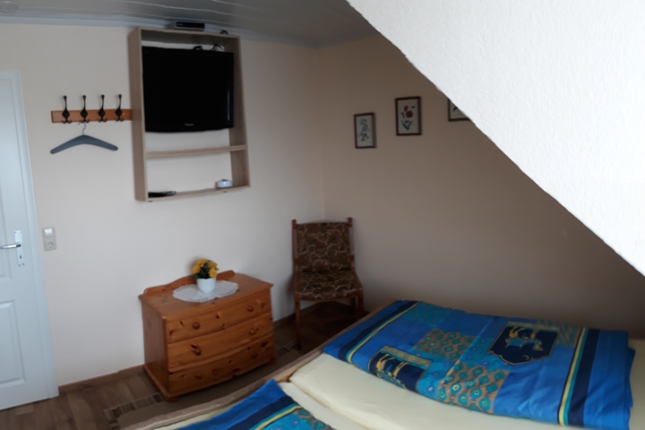 Schlafzimmere mit Fernseher