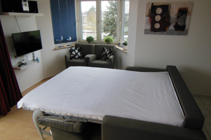 Hochwertiges Schlafsofa, welches ausgzogen eine richtige Matratze bietet.