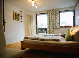 Schlafzimmer mit Balkon