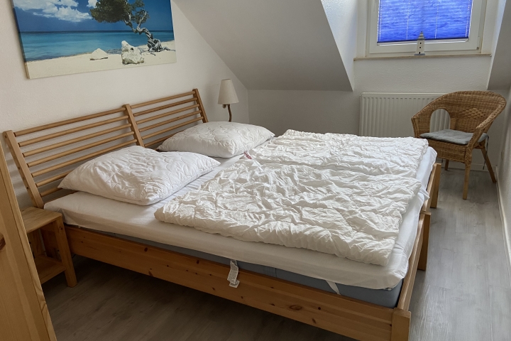 Schlafzimmer mit Doppelbett