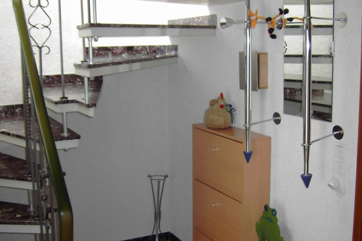 Aufgang zu den Schlafzimmern und Bad
