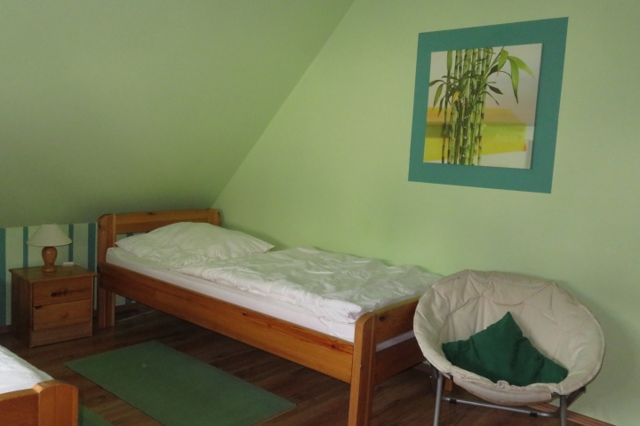 Schlafzimmer II mit zwei Einzelbetten kombinierbar zum Doppelbett
