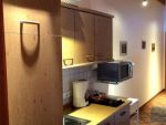 Wohnbeispiel: Küchenzeile mit Zustellofen, großer Kühlschrank (inkl. Gefrierfach), zwei Plattenherd