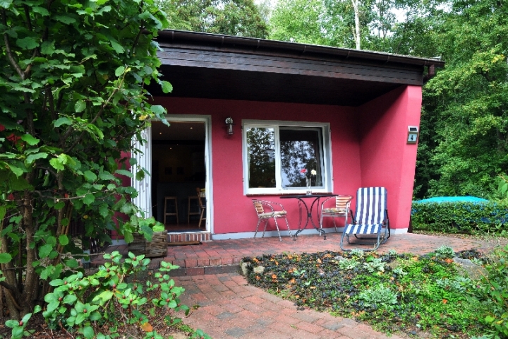 Ferienhaus Am Fleesensee | Terrasse mit Sonnenliegen