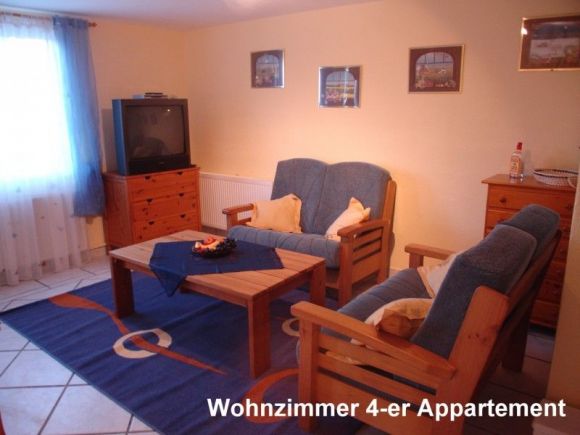 Appartements Heermann | Das gemütliche und komfortable Wohnzimmer des 4-Personen-Appartements.