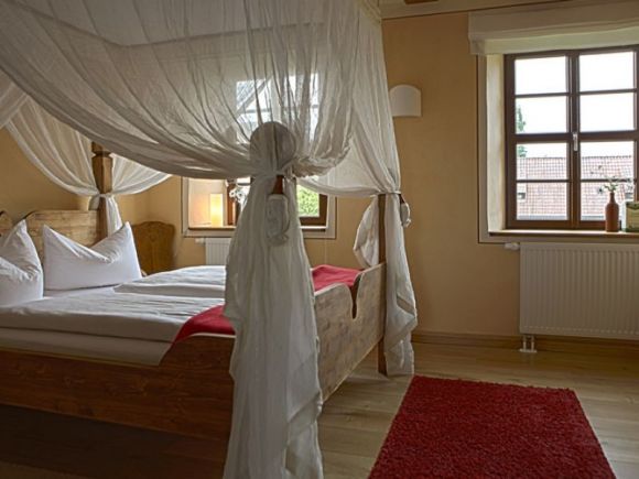 Ferienwohnungen Rittergut Positz | eines der Schlafzimmer in der Ferienwohnung 