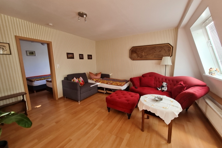Wohnzimmer mit Doppelbettsofa