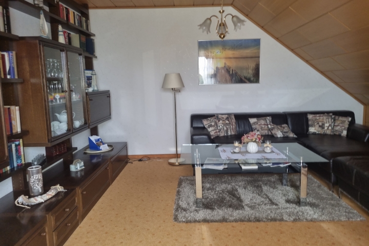 Susis Ferienwohnung | Das gemütliche Wohnzimmer mit echt Leder Rundcoach