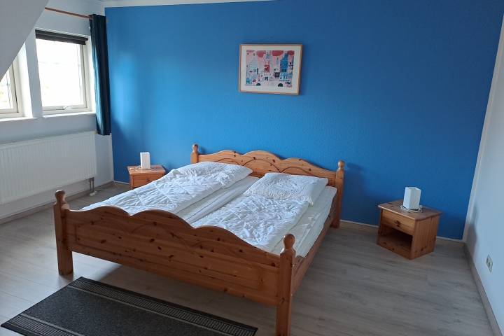 Sclafzimmer mit Doppel- und Einzelbett
