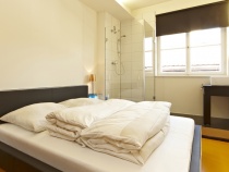 Schlafzimmer mit privater Dusche