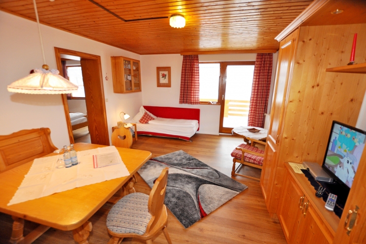 Wohnzimmer mit Aufbettung Ferienwohnung 
