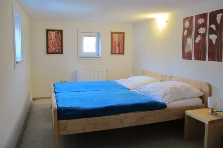 Doppelbettzimmer im Grünen Haus,
Betten sind auch voneinander trennbar.