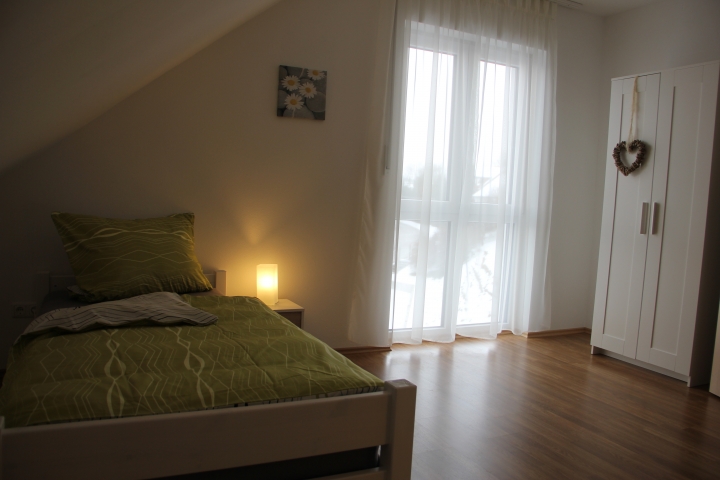 Schlafzimmer mit 2 getrennten Betten
Apartment 5 ( 3 und 4 ähnlich)