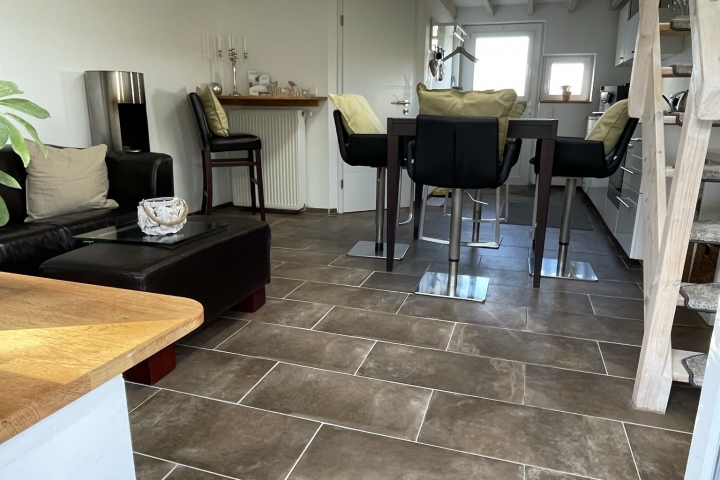 Ferienwohnung Deichkieder Südwesthörn | Blick von der Küche zur Kuschelecke
