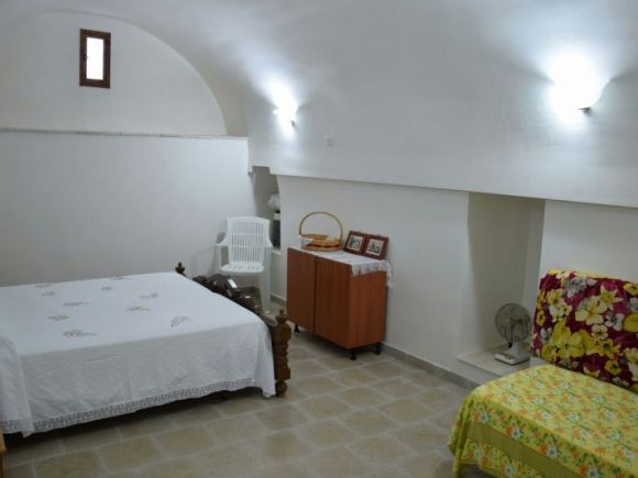 Ferienhaus Casa Maria | Schlafzimmer mit Doppelbett und Schlafcouch