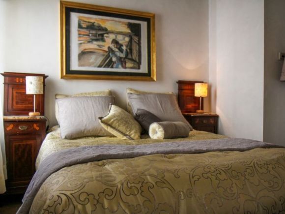 Casa Grifone 200 steps from the Coliseum | bedroom