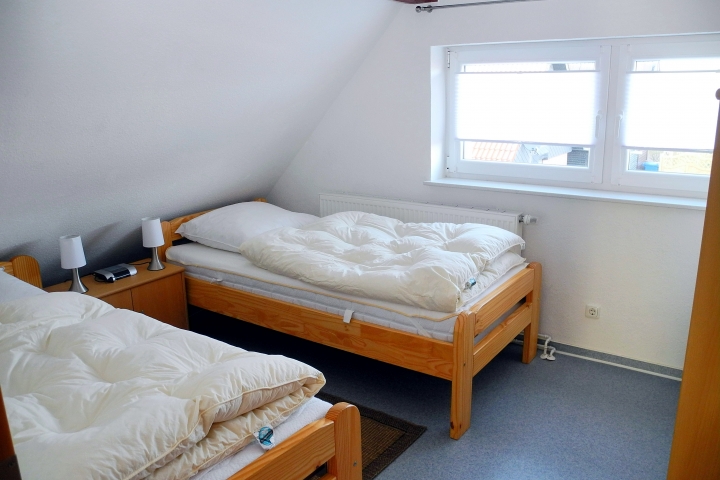 Schlafzimmer 3 im DG - Ferienhaus Krabbe in Friedrichskoog-Spitze