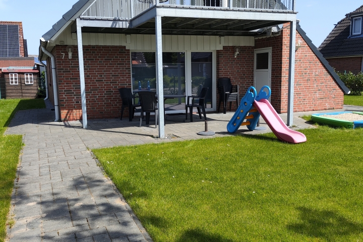 Ferienhaus Krabbe Friedrichskoog Rasen vorn