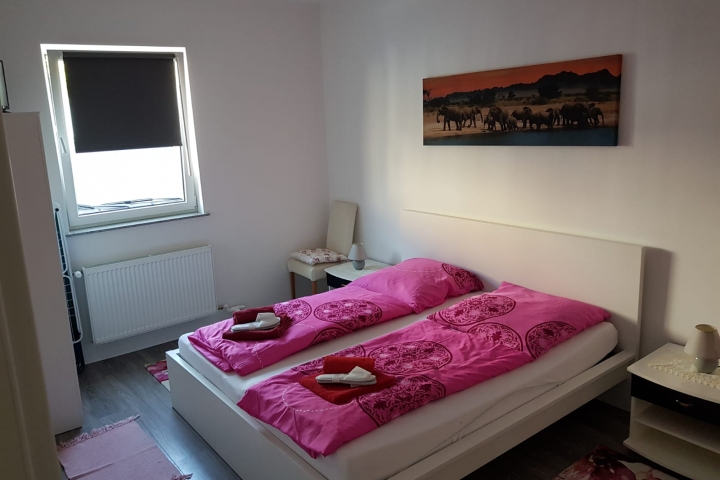 3. Schlafzimmer mit einem Doppelbett und einem Einzelbett