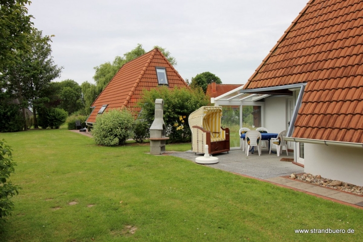 Überdachte Terrasse mit festem Grill