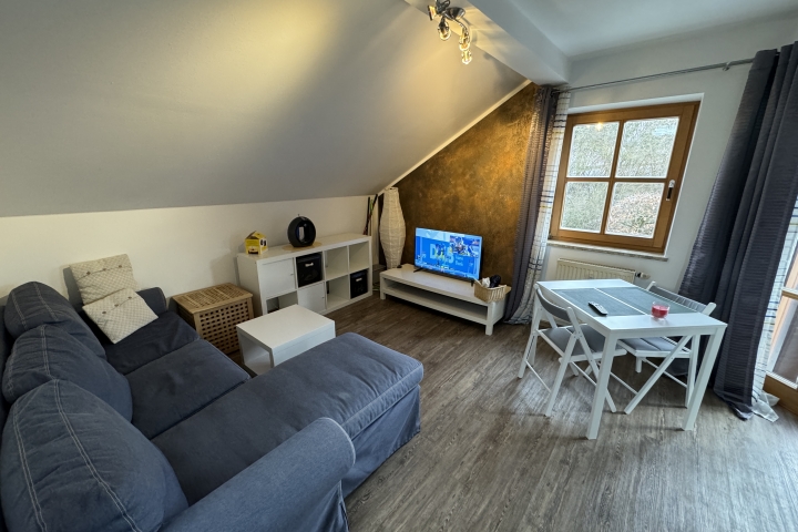 Ferienwohnung Nele inmitten der Natur | Wohnbereich mit gemütlicher Sofaecke