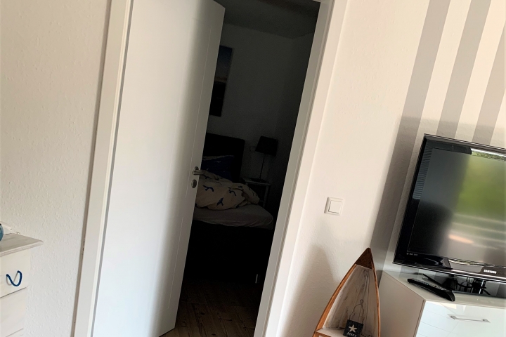 Wohnbereich mit Übergang ins Schlafzimmer 