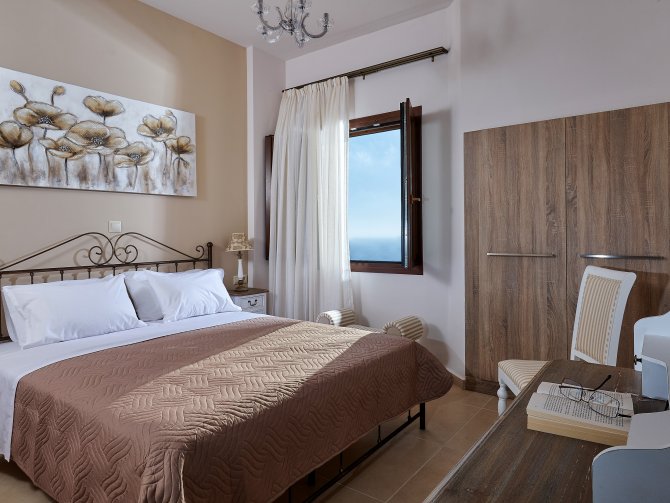 Orelia Cretan Deluxe Ferienwohnung - Das 1. Schlafzimmer mit Doppelbett