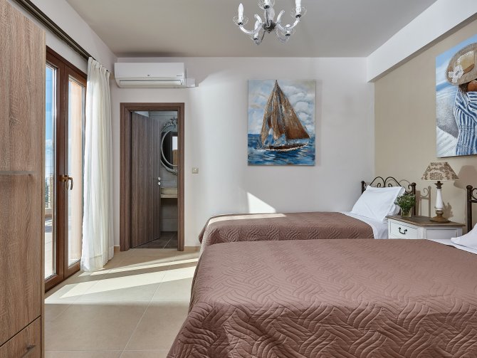 Orelia Cretan Deluxe Ferienwohnung -         
Das 2. Schlafzimmer mit zwei Einzelbetten