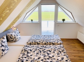 Haus Holiday Dahme/ Ostsee: Elternschlafzimmer Wohnung Holiday 3