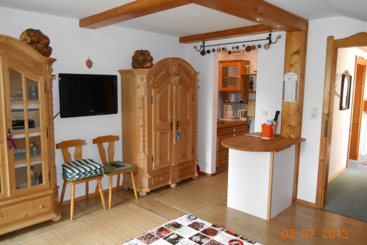 Wohnraum mit Kochinsel Komfort Apartment DACHSTEIN