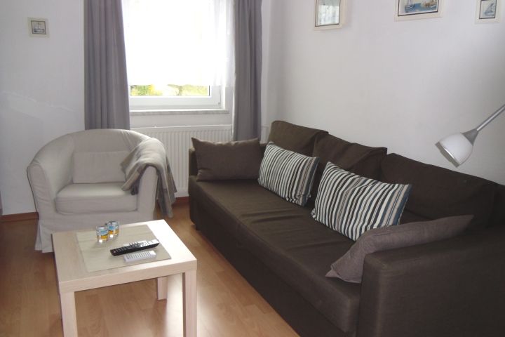 Ferienwohnung Lachmöwe | Wohnzimmer mit Schlafcouch
