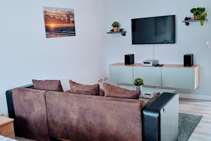 Wohnbereich mit TV und Radio