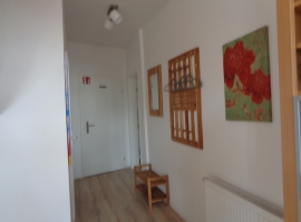 Eingangs- und Flurbereich mit Garderobe der Wohnung Kornspeicher