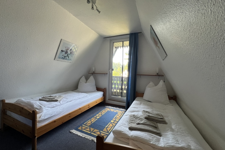 Schlafzimmer 2 mit 2 Einzelbetten im OG.