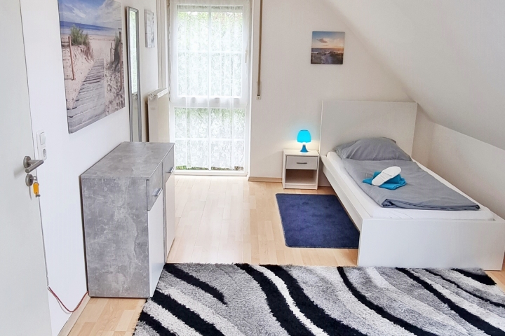 Schlafzimmer mit 2 Einzelbetten