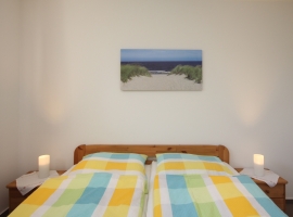 Schlafzimmer 1 mit Doppelbett (Haus unten)