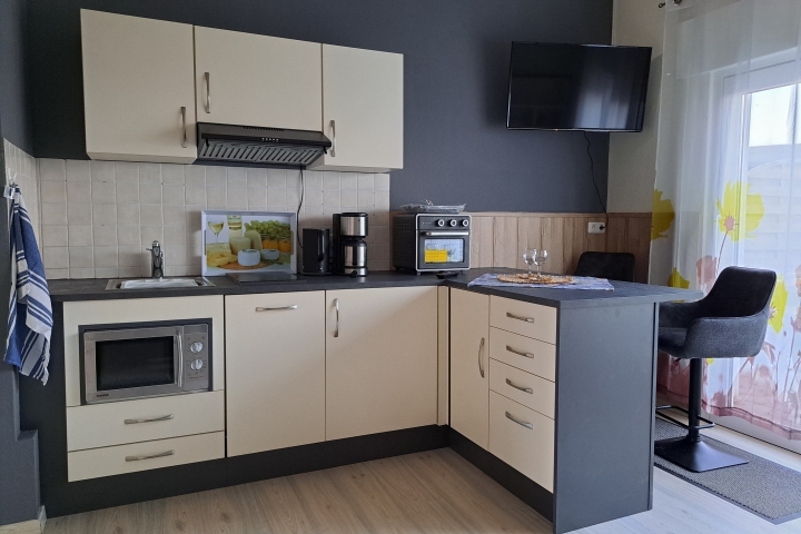 Die Küche ist voll ausgestattet mit spüllmaschiene
Diese Wohnung ist wunderbar für 2 Personen geeignet  