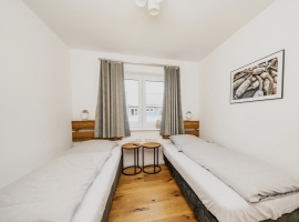 Beispielbild Innenausstattung Schlafzimmer mit zwei Einzelbetten